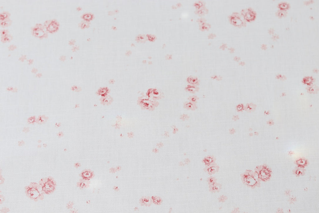 Faded Floral Linen Fabrics with our Mimi design on fine oyster linen