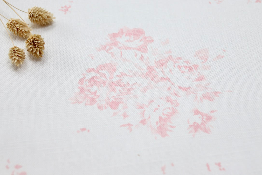 The Faded Floral Company - Faded Floral Linen Fabrics - Our Camille design in pink with leaf on luxury white linen