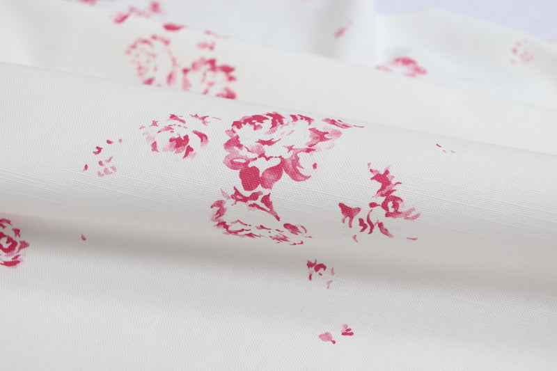 Faded Floral's Camille print in Cerise, printed on fine oyster linen fabric 