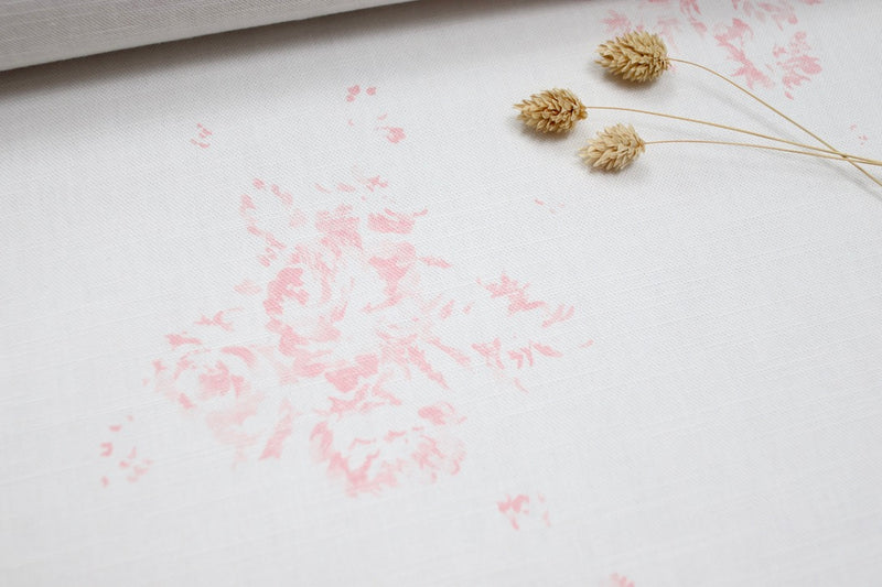 Faded Floral Linen Fabrics collection from the Faded Floral Company. Camille pink with leaf on luxury white linen