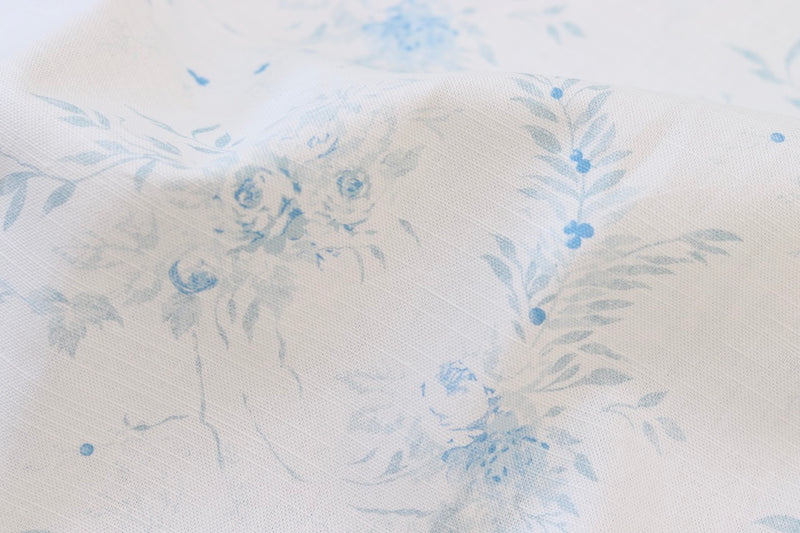 Aimée Bleu on Oyster Linen from our Faded Floral Linen Fabrics collection 