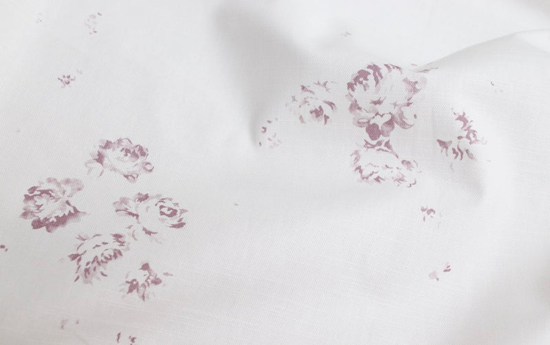 From our Faded Floral Linen Fabrics collection; our Camille print in a vintage lilac colour way printed on fine linen