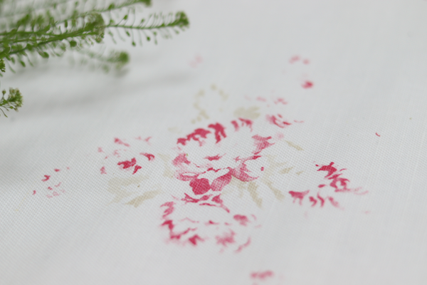 Faded Floral Linen fabric in cerise and fawn colour way in Camille print, on oyster Linen
